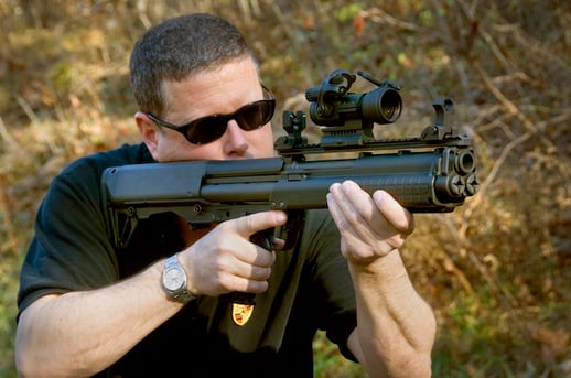 The author demonstrates improper hand placement on the Kel-Tec KSG (courtesy David Kenik for The Truth About Guns) kel tec ksg shooting